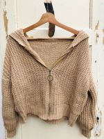 Vest met capuchon